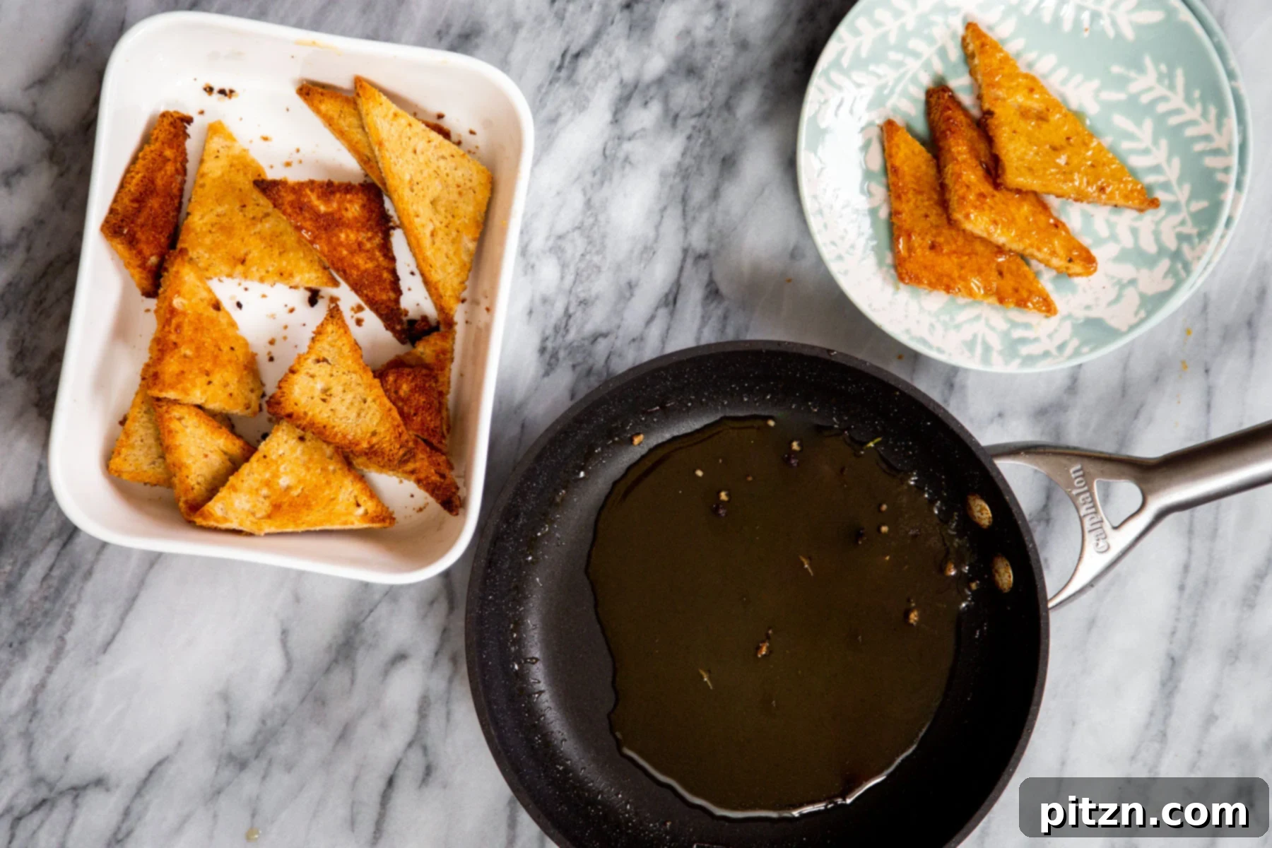 Shahi Tukda Royal Golden Toasts with Rabri Custard 10 Toasted bread slices arranged next to a saucepan containing the warm sugar syrup, ready for assembly.