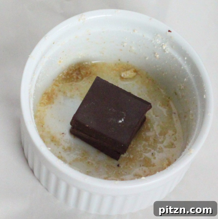 Stacked vegan chocolate bars, ready to be melted into decadent treats.