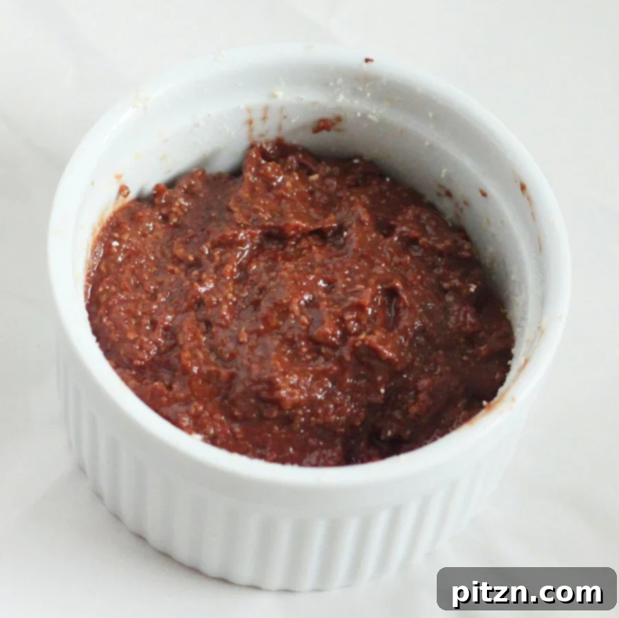 Molten lava cake batter smoothed into a ramekin.