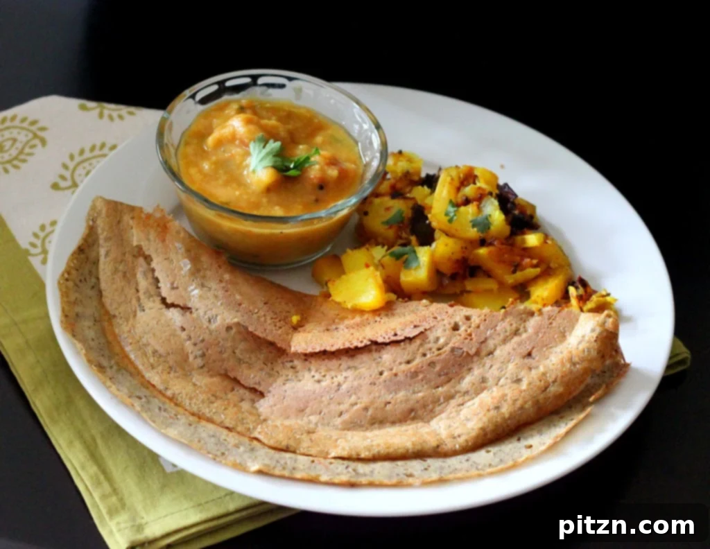 Dosa A Savory Vegan Glutenfree Lentil and Rice Crepe 3 Close-up of a freshly made Dosa