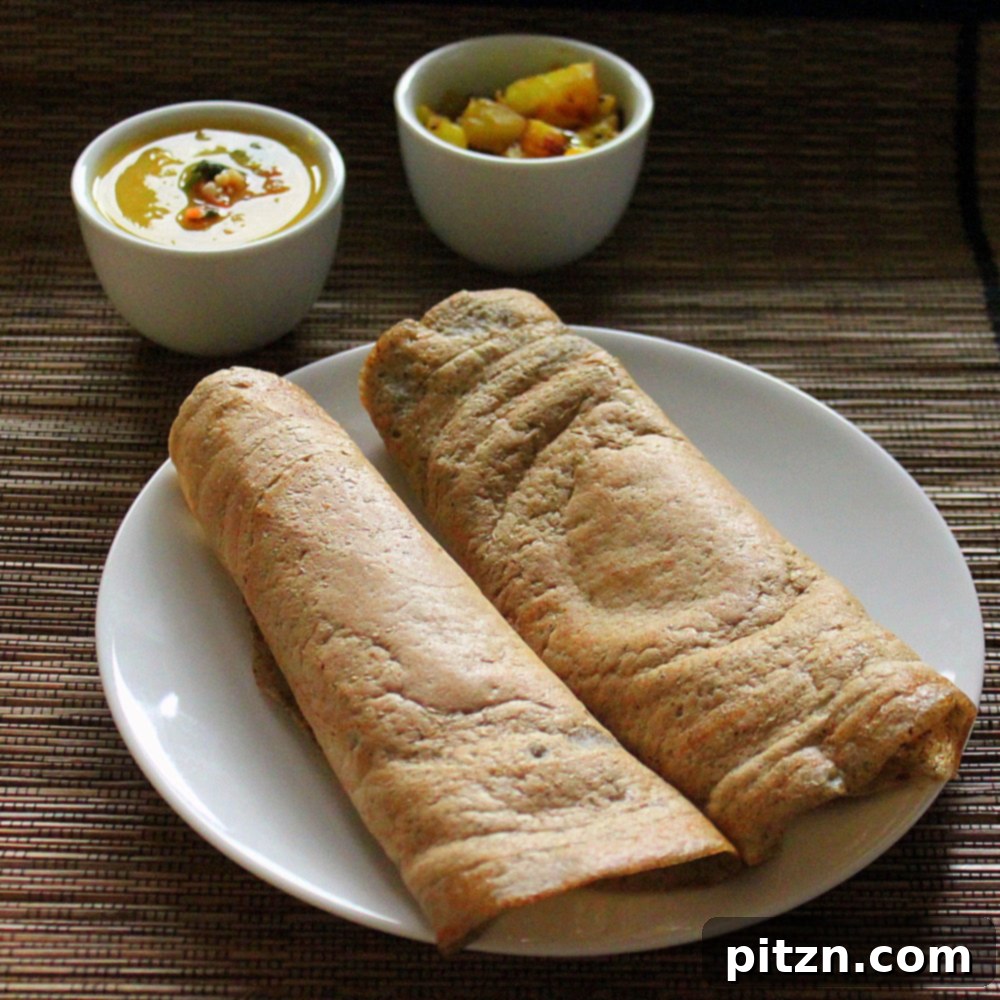 Dosa A Savory Vegan Glutenfree Lentil and Rice Crepe 5 Two dosas on a plate, ready to be served
