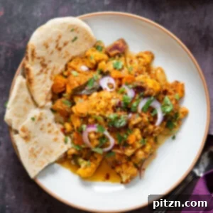 Hearty Vegan Malabar Curry 5 A vibrant Malabar curry with a rich coconut gravy and fresh vegetables.