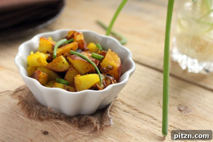 Aromatic Fennel Mustard Potato Leek Subzi Vegan Glutenfree 2 Indian Potato Leek Stir-Fry with whole spices in a serving bowl