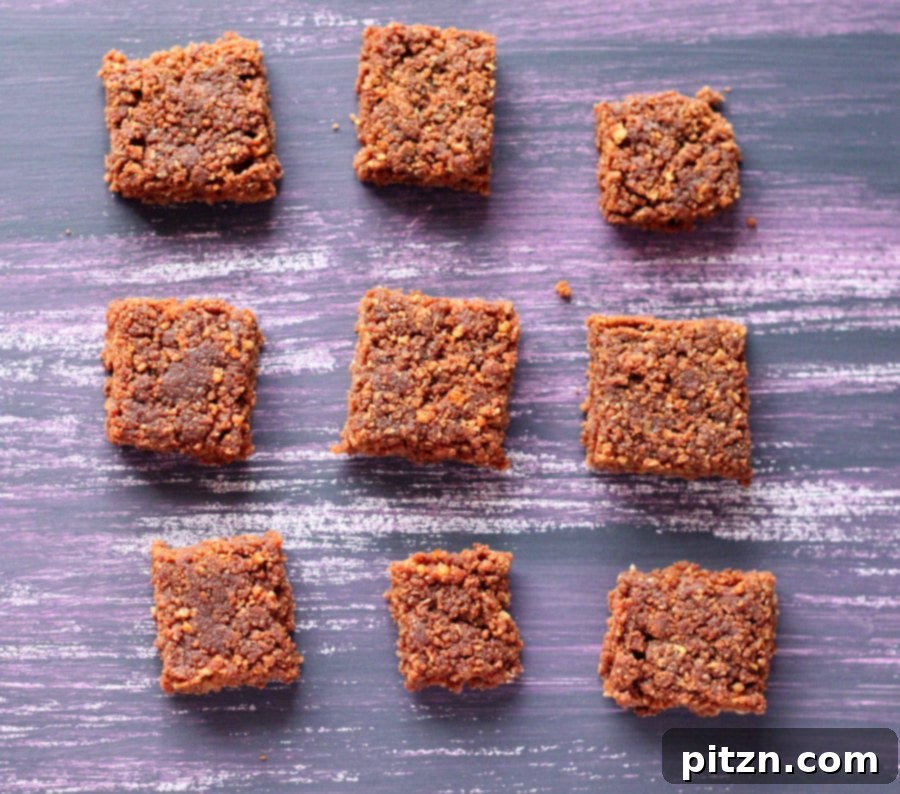 Close-up of the no-bake chocolate almond bars arranged neatly on a serving platter