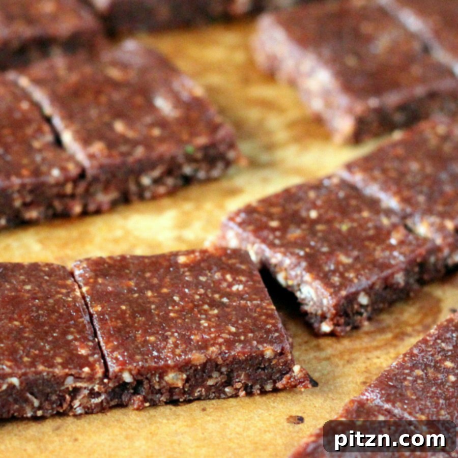 A close-up of the zesty chocolate almond bars, highlighting their texture and chocolate coating