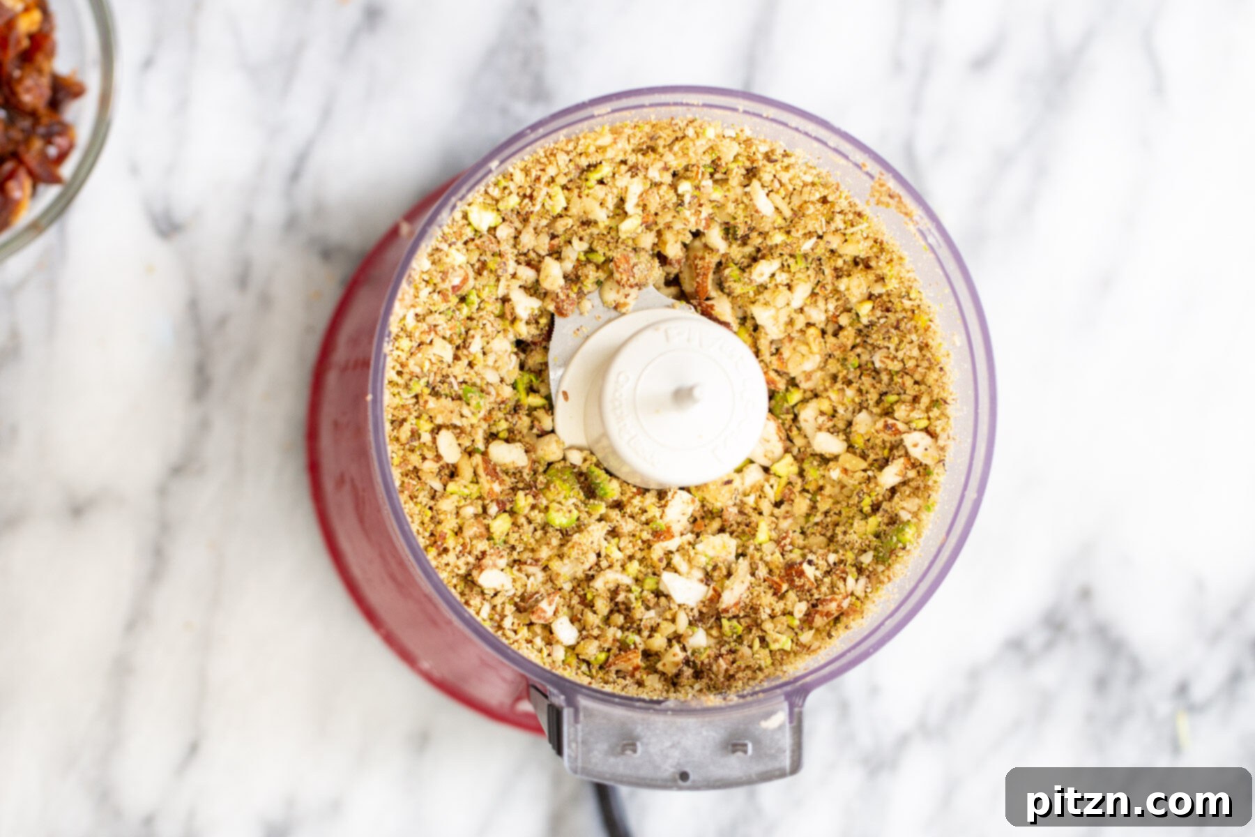 The coarsely chopped nuts in a food processor, perfectly textured for the baklava filling.