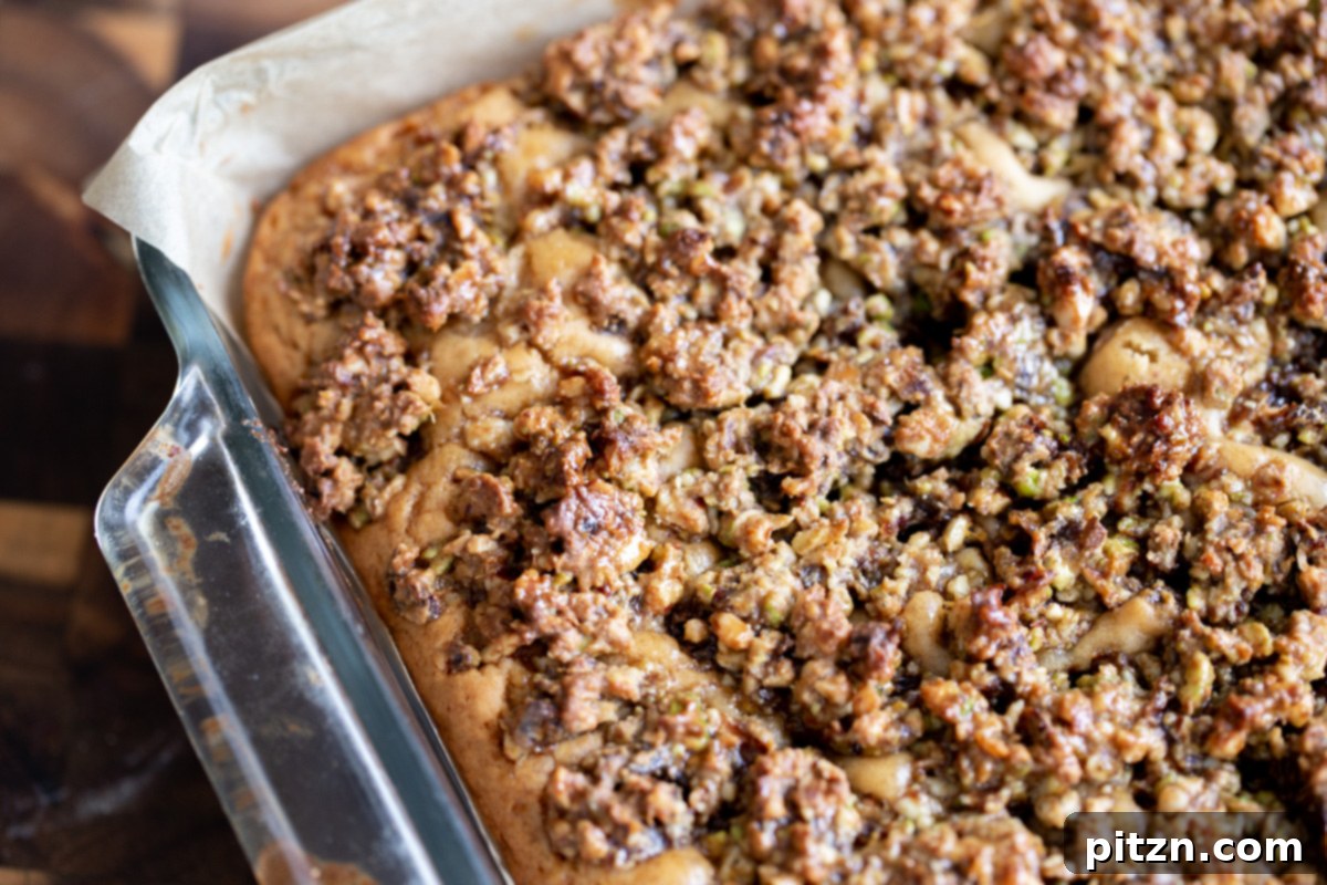Freshly baked vegan baklava cake in a brownie pan, golden brown and fragrant.