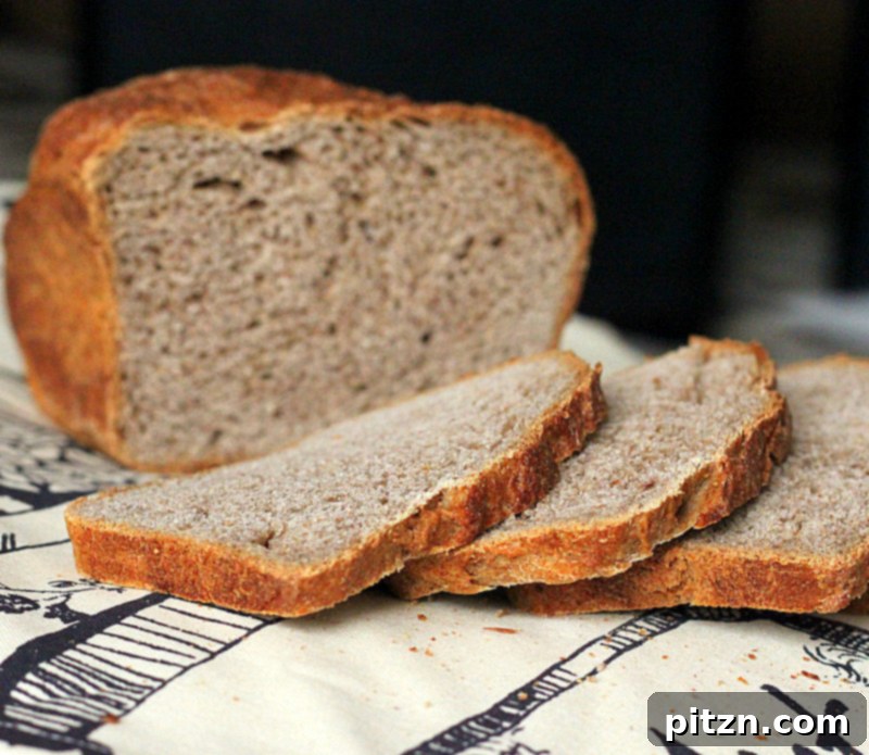 Simple No-Knead Vegan Strawberry Wheat Bread 6 Another perspective of the sliced No-Knead Strawberry Wheat Bread Loaf, showing its inviting texture.