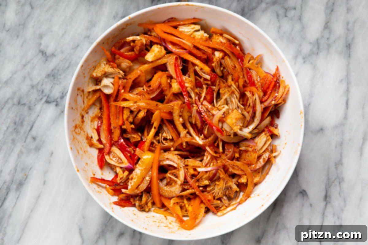Quick & Easy Vegan Jackfruit Tacos 13 shredded jackfruit and veggies tossed with marinade ingredients