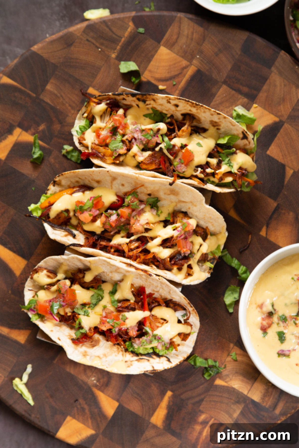 Quick & Easy Vegan Jackfruit Tacos 20 three vegan jackfruit tacos topped with queso and cilantro