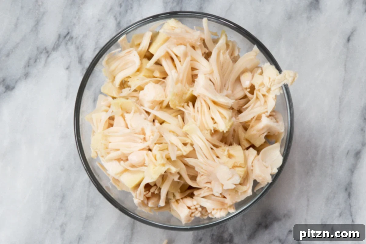 Quick & Easy Vegan Jackfruit Tacos 9 shredded jackfruit in a small glass bowl
