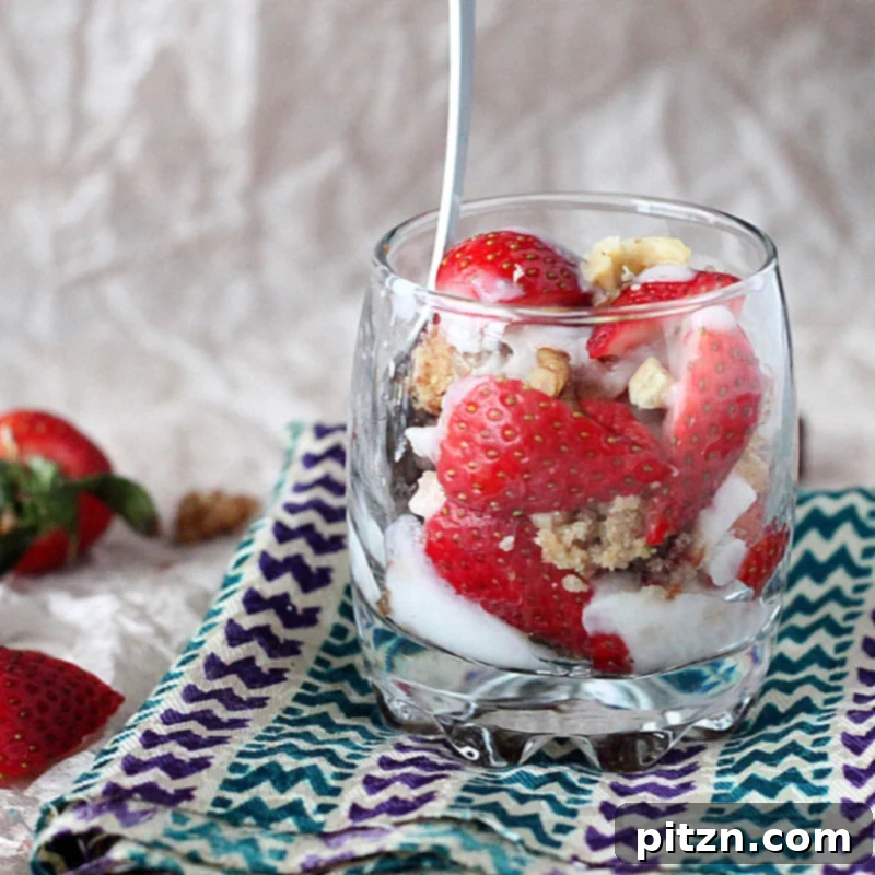 Vegan Gluten-Free Gum-Free Spiced Oat Almond Cake Parfait with Strawberry, Nuts & Goji Berries 6 Another view of a layered spiced oat almond gluten-free cake parfait with fresh fruit on top, emphasizing the deliciousness