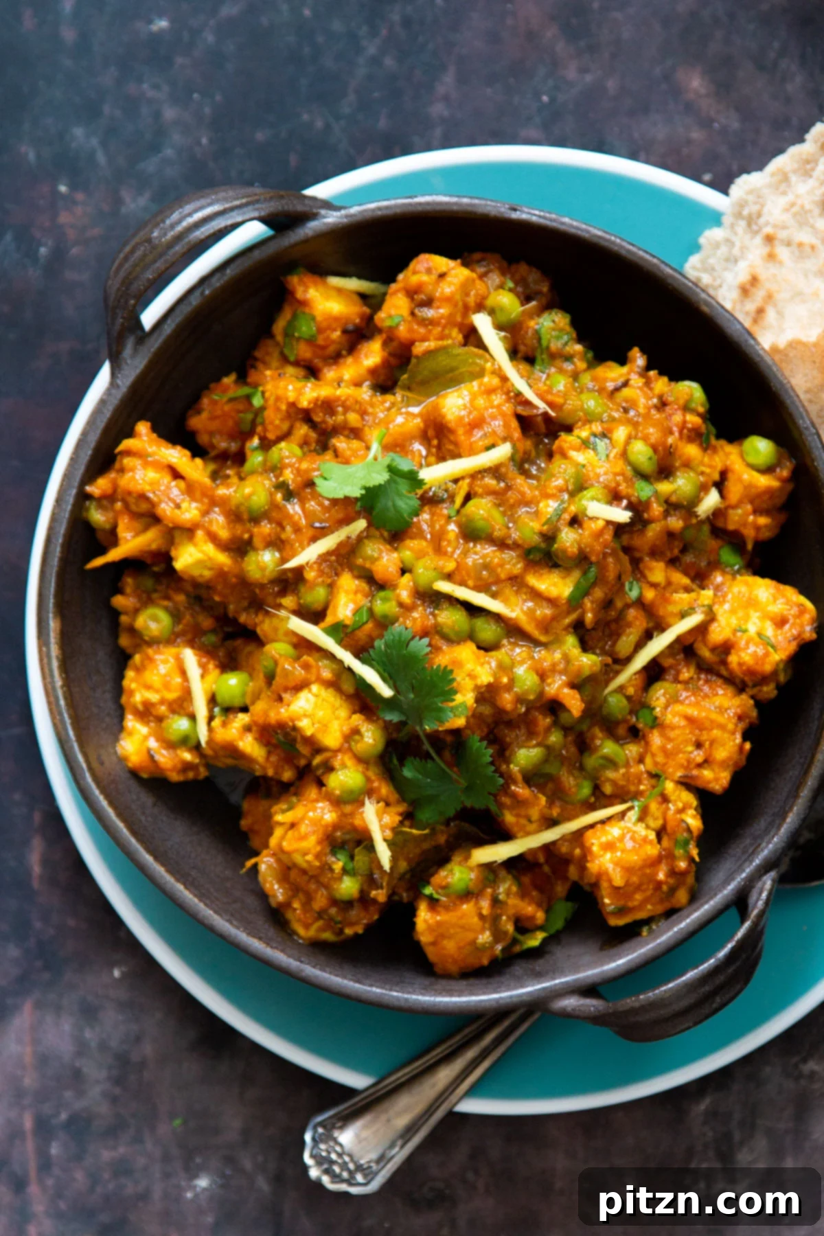 Vegan Tofu Matar 2 vegan matar tofu served in a small skillet with a side of flatbread