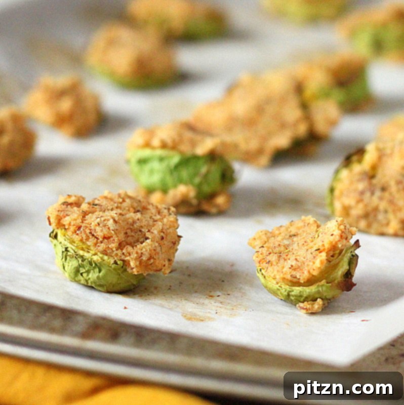 Golden and crisp breaded Brussels sprouts, freshly baked out of the oven, ready to be served
