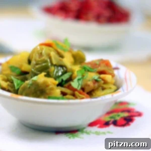 Brussel sprouts and potato served in a white bowl