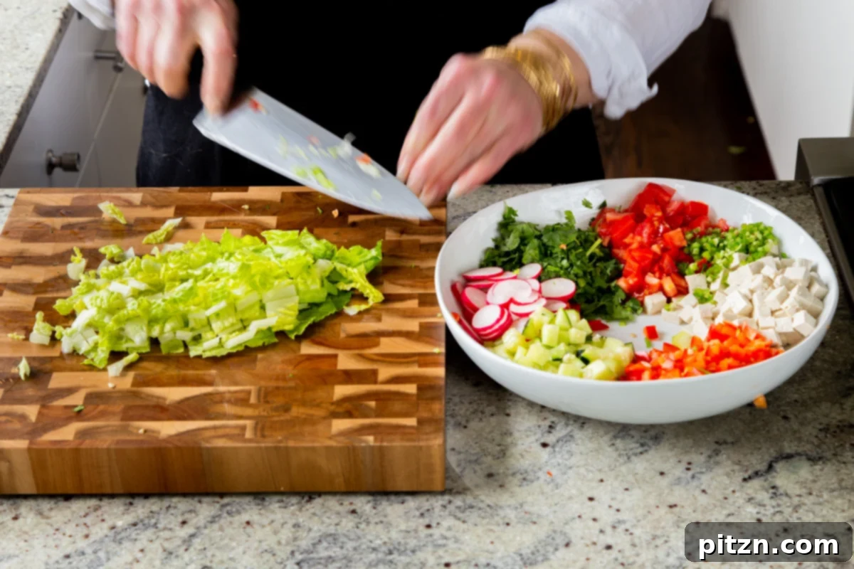 Wholesome Chaat Masala Chopped Salad 10 chopping the lettuce