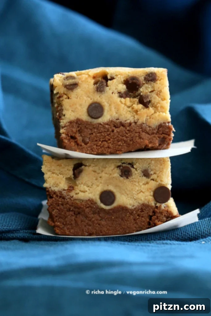 No Bake Vegan Cookie Dough Brownies Gluten Free High Protein 4 A top-down view of Vegan Cookie Dough Brownies cut into perfect squares, highlighting the distinct layers of rich brownie and sweet chocolate chip cookie dough. Ideal for vegan, gluten-free, and soy-free diets.