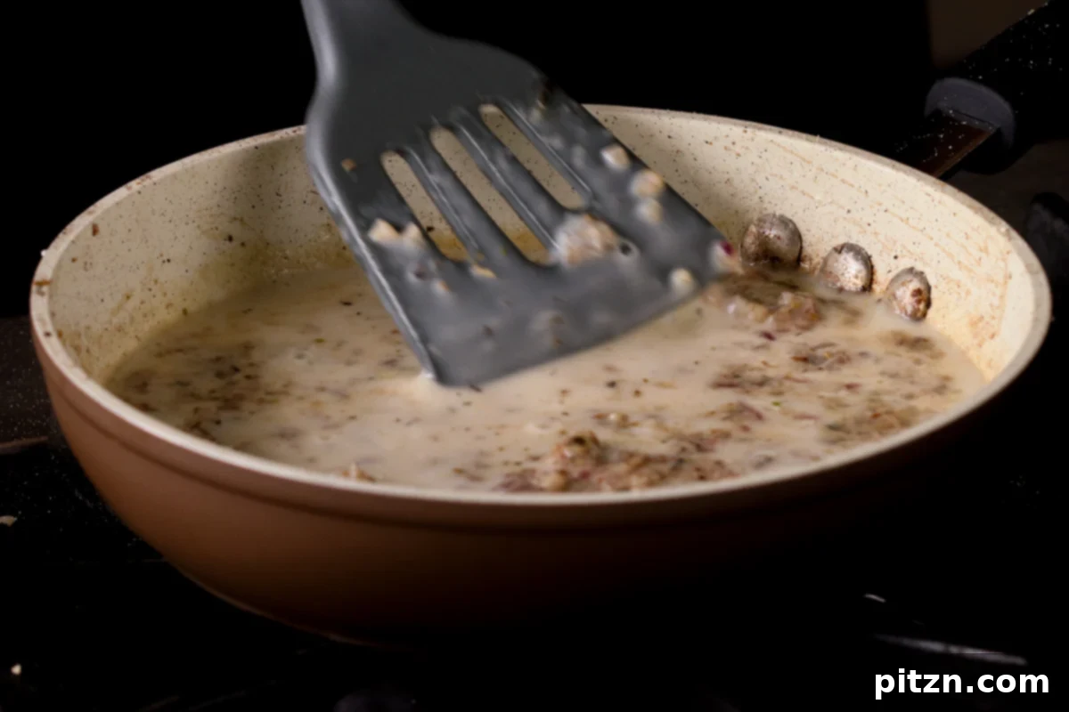 Comforting Delicata Squash and White Bean Casserole 14 mixing roux into the non-dairy milk