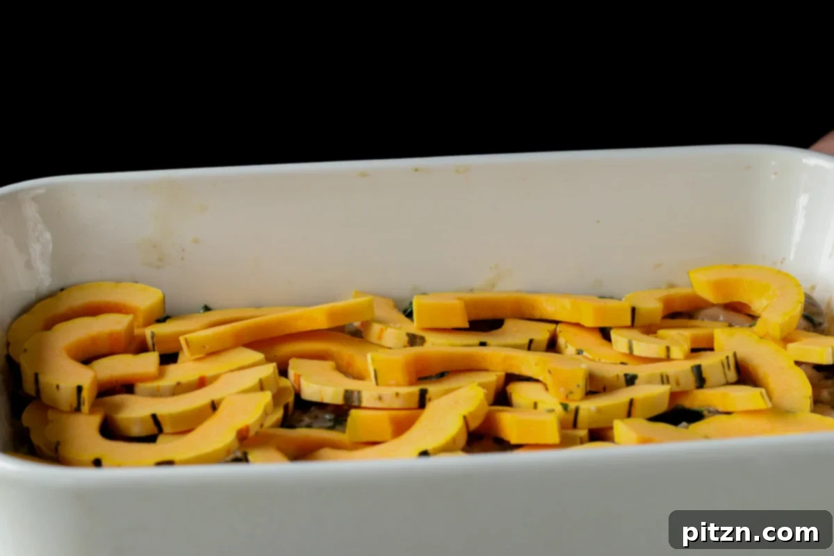 Comforting Delicata Squash and White Bean Casserole 19 delicata squash layered over the beans mixture in the casserole dish