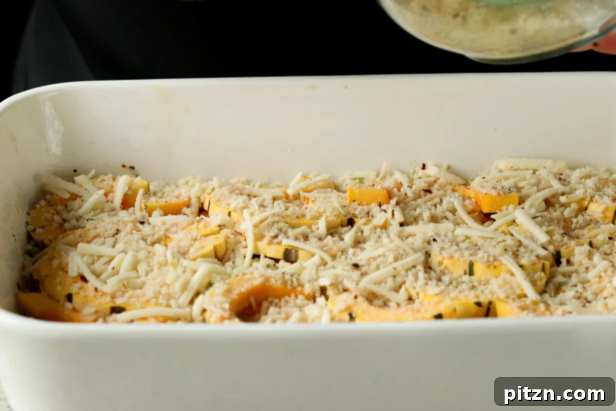 Comforting Delicata Squash and White Bean Casserole 23 cheese-breadcrumb mixture added to the squash casserole in the pan, before baking