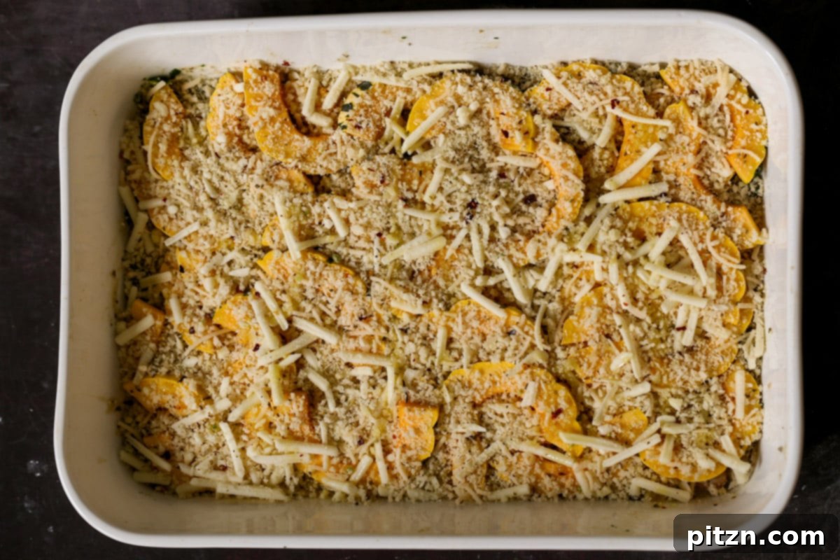 Comforting Delicata Squash and White Bean Casserole 24 delicata squash casserole in the baking pan before baking