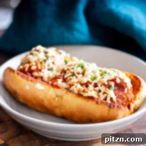 A savory plate of vegan meatball subs, showcasing hearty plant-based meatballs nestled in bread.