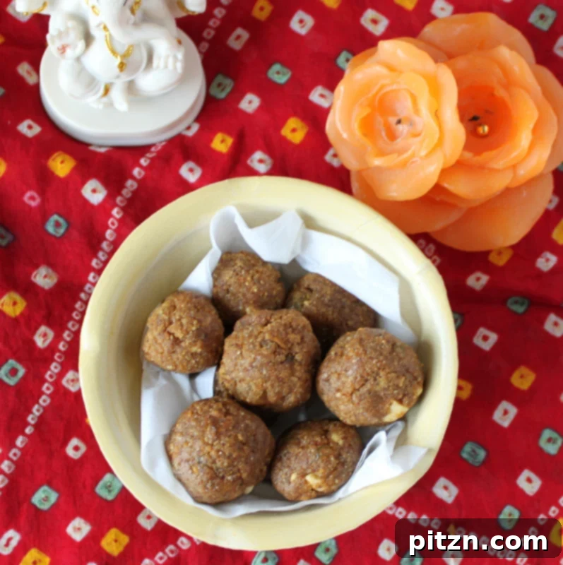 Vegan Indian Besan Laddoo Sweet Chickpea Delight with Cashews and Raisins 7 Various Besan Laddoos arranged elegantly
