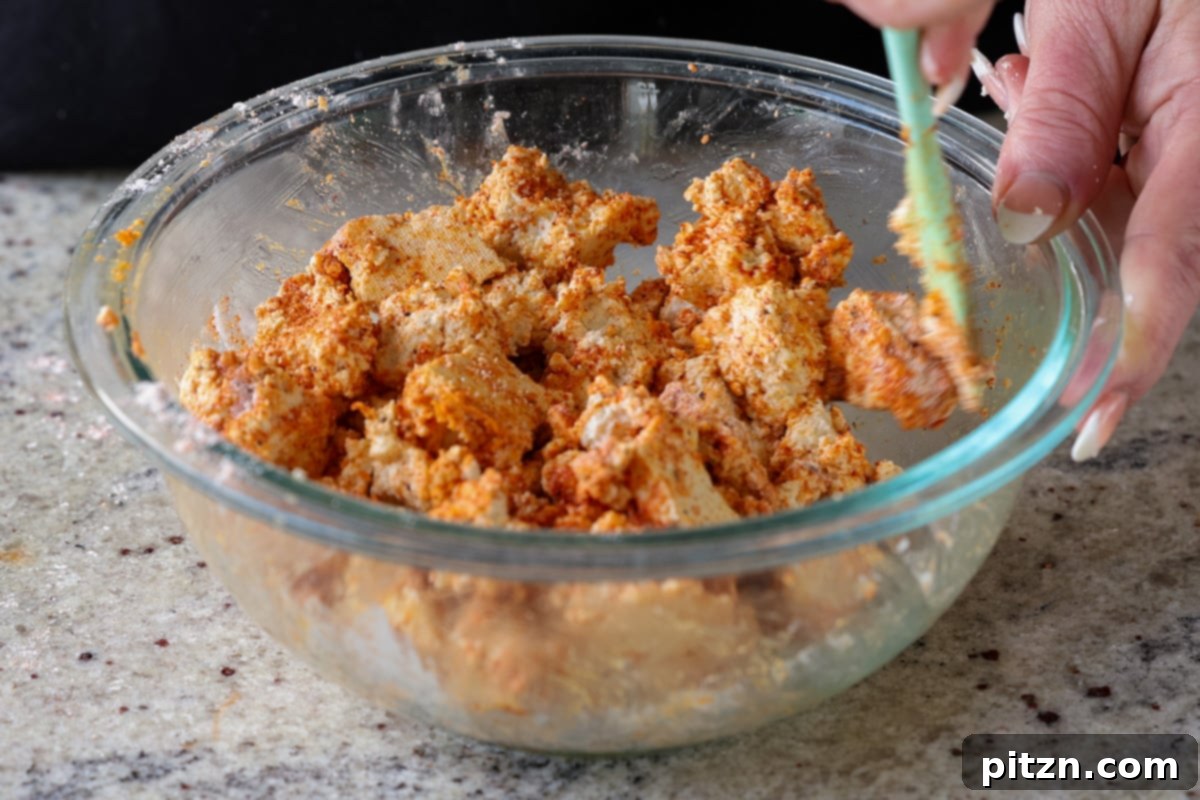 Tofu Kondattam: Crispy & Spicy South Indian Tofu 11 Tofu pieces fully coated with cornstarch and spices, ready for baking