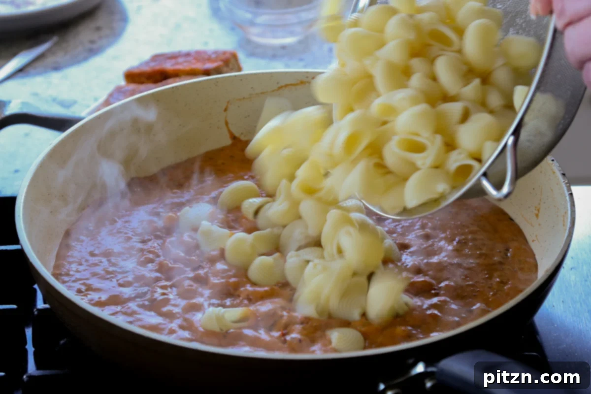 Vegan Marry Me Chicken Pasta 21 Adding cooked pasta directly into the vegan marry me chicken sauce