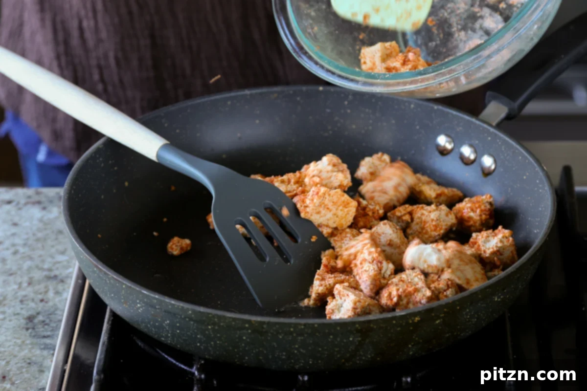 North Indian Smoky Rara Chicken Curry 14 adding tofu to the pan
