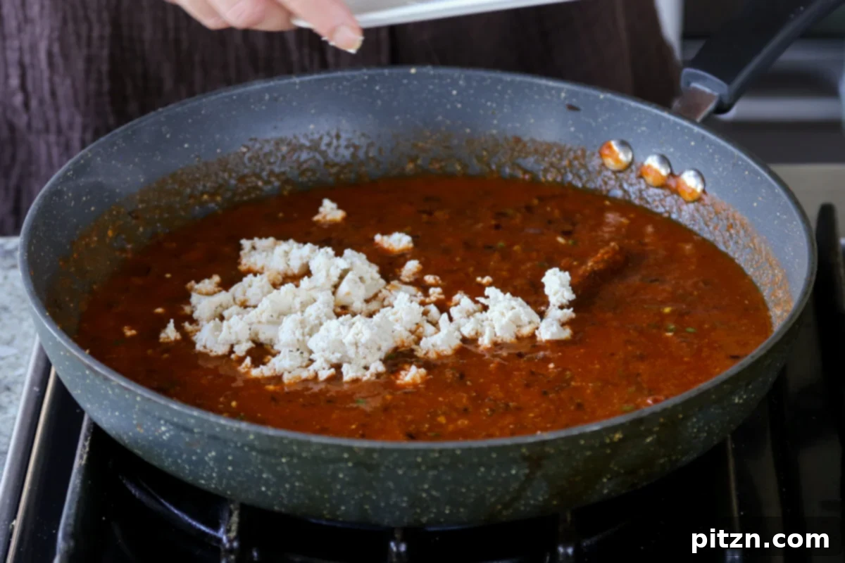 North Indian Smoky Rara Chicken Curry 25 adding crumbled tofu