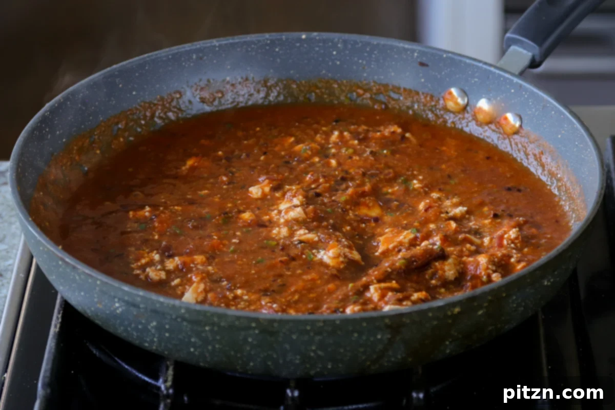 North Indian Smoky Rara Chicken Curry 26 rara chicken curry sauce after cooking