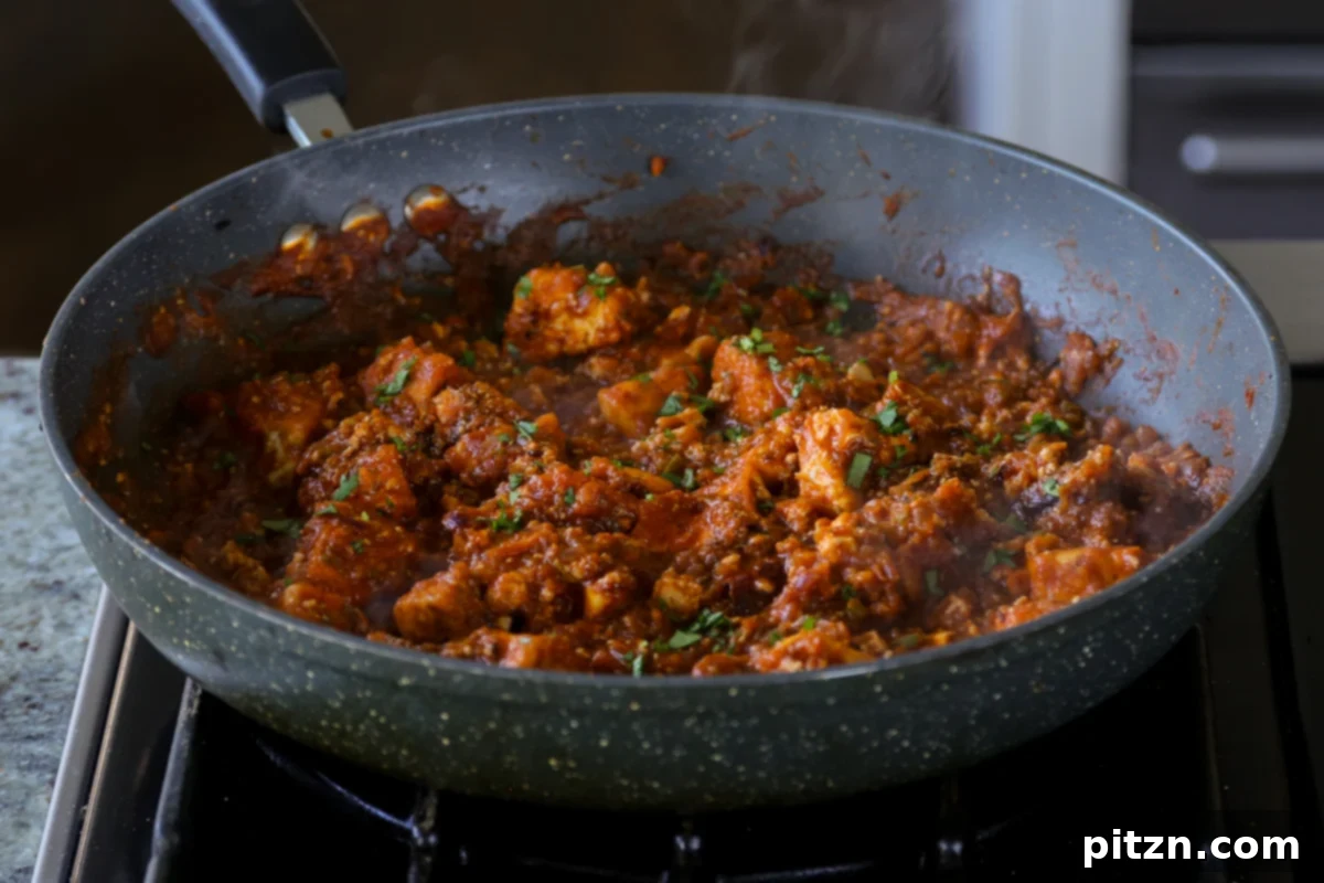 North Indian Smoky Rara Chicken Curry 29 rara chicken curry in the pan after cooking