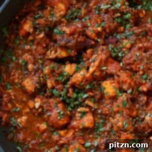 North Indian Smoky Rara Chicken Curry 6 rara chicken curry in the pan after cooking