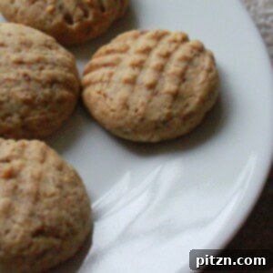 Almond butter cookies served on a white plate