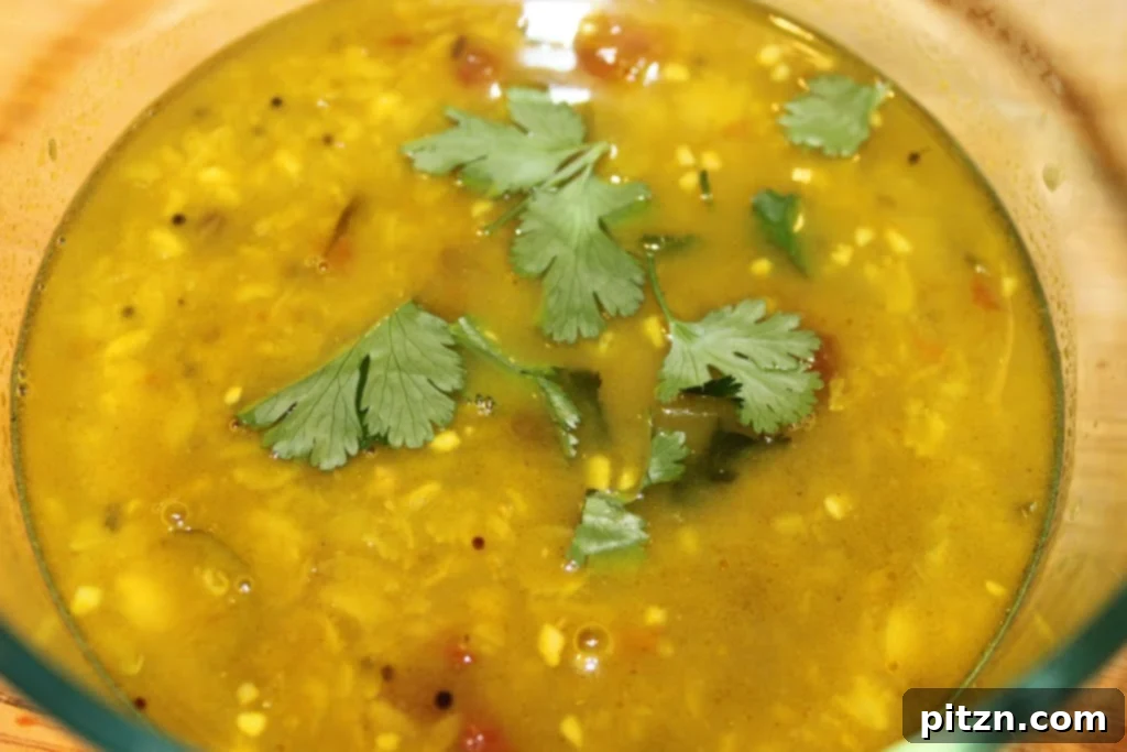 Teen Daal Tadka (3 Lentil Curry). A quick lentil curry, serve hot topped with fresh cilantro, garam masala, lime juice and serve with fresh dinner rolls! #glutenfree #veganricha #vegan