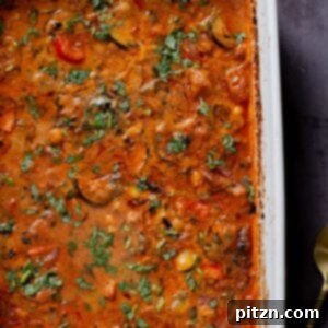 zucchini chickpea curry in the pan after baking