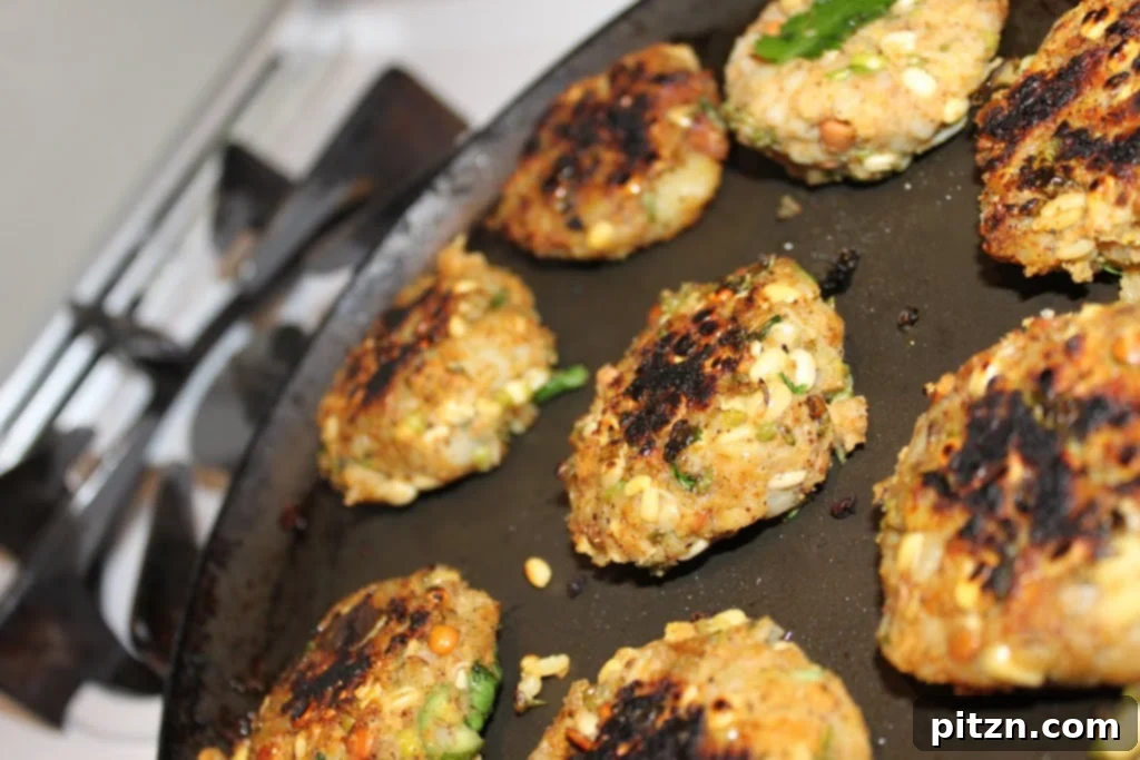 Wholesome Sprout Potato Burgers 3 Uncooked vegan potato and sprout mixture, shaped into patties, ready for frying in a pan.