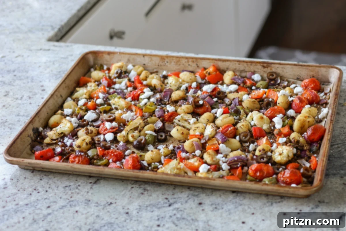 One-Pan Mediterranean Gnocchi: No Boil, Big Flavor 13 Fresh basil, kalamata olives, and vegan feta added to the baked gnocchi and vegetables on the sheet pan.