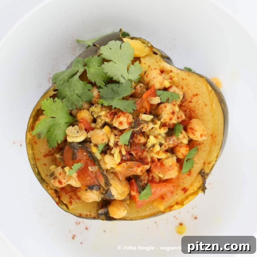 Quick Curried Chickpea Stuffed Acorn Squash 6 Garnished Curried Chickpea Stuffed Acorn Squash served for a delicious meal