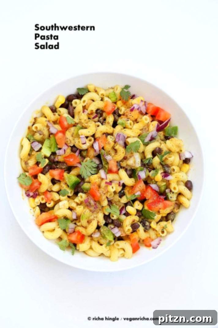Our vegan Southwestern pasta salad with black bean dressing in a white bowl