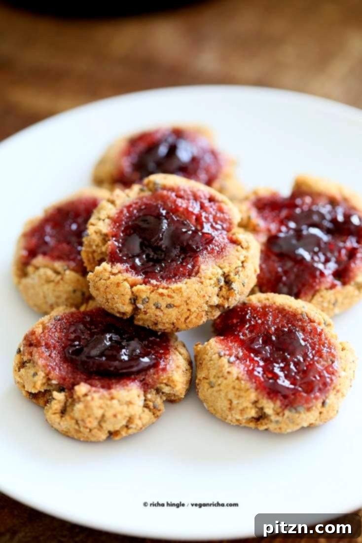Cherry Almond Thumbprint Cookies - Almond Pulp Cookies | Vegan Richa #vegan #cookie #oilfree #nutbutter