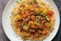 Harissa-Spiced Roasted Vegetables with Creamy Bean Puree and Toasted Walnut Crumble