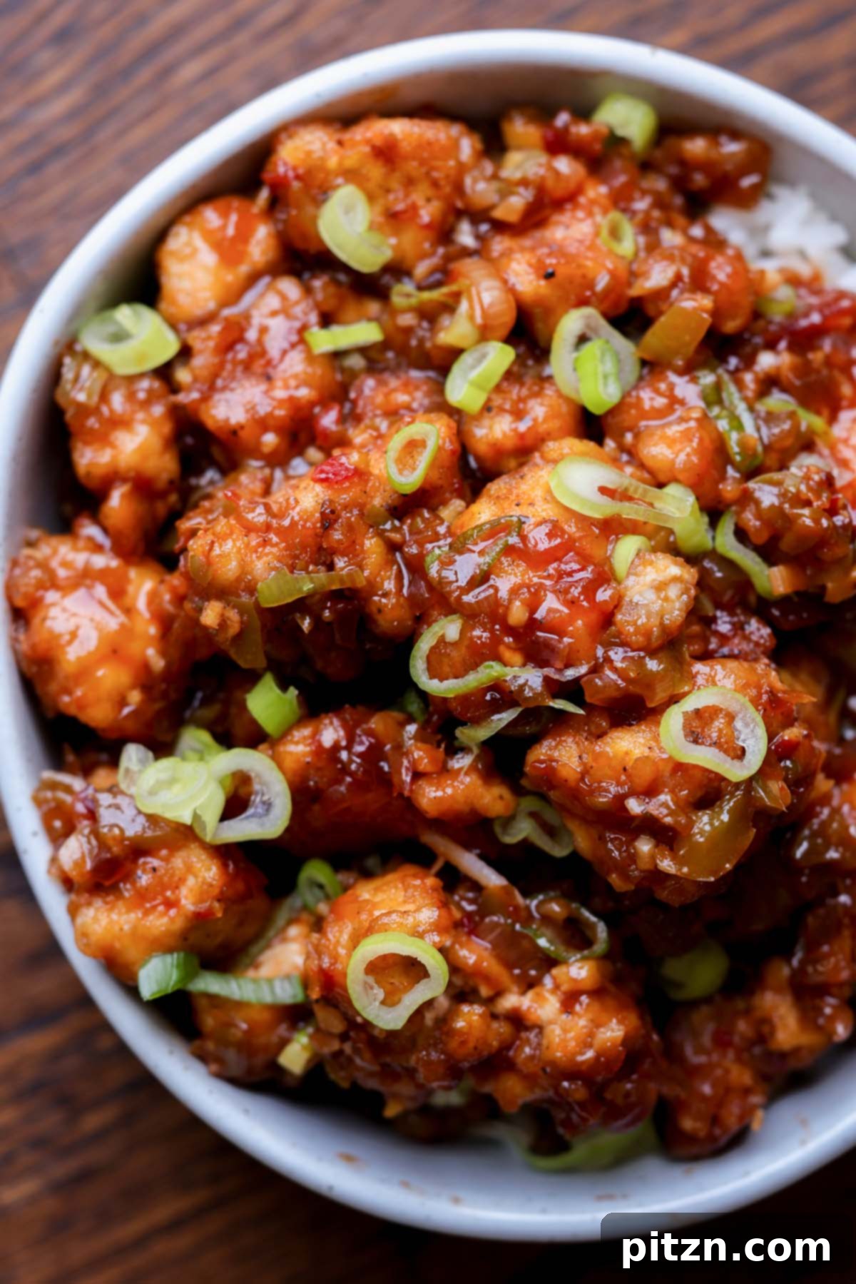 Indochinese Garlic Black Pepper Chicken 4 Indo-Chinese garlic pepper tofu served in a bowl, ready to be enjoyed