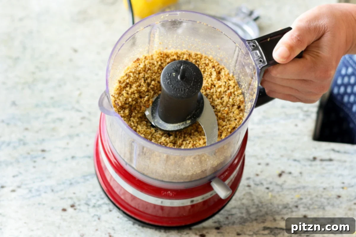 Walnuts in the food processor after grinding