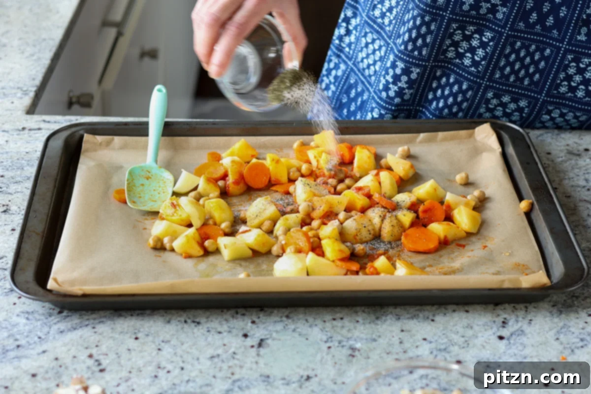 Seasoning the veggies before roasting