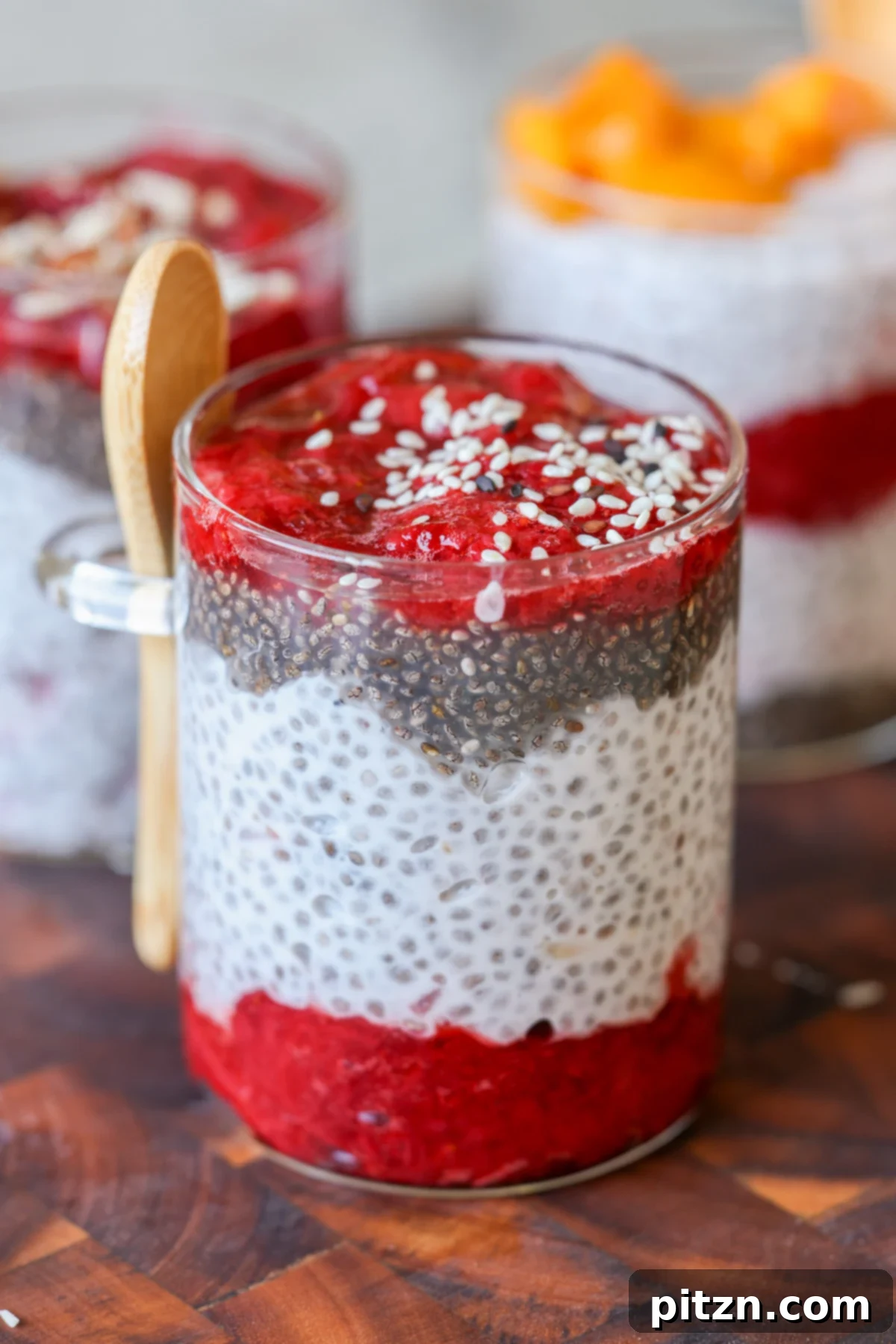 Strawberry chia pudding topped with hemp seeds.