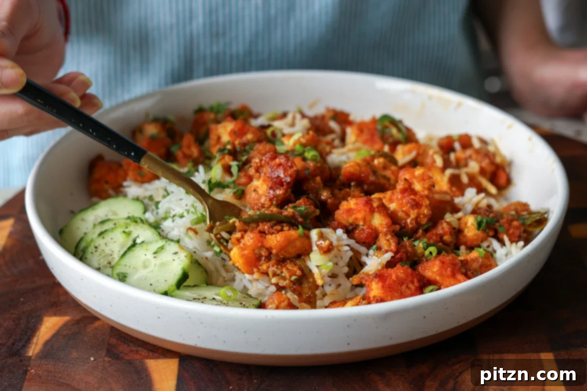 apollo tofu on a plate with rice and cucumber