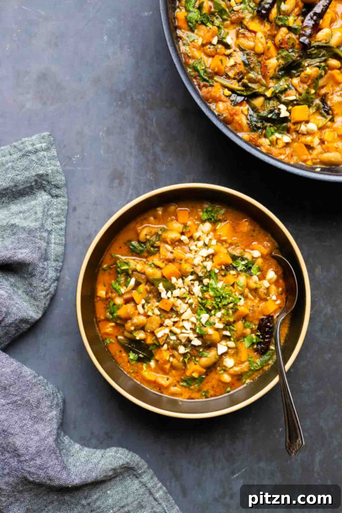 Aromatic Sweet Potato and White Bean Curry Stew 2 bowls of Indian-inspired white bean stew