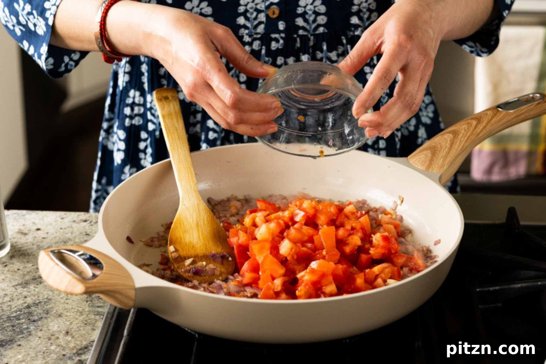 Peri Peri Pan Roasted Chickpeas 12 adding tomato to the pan
